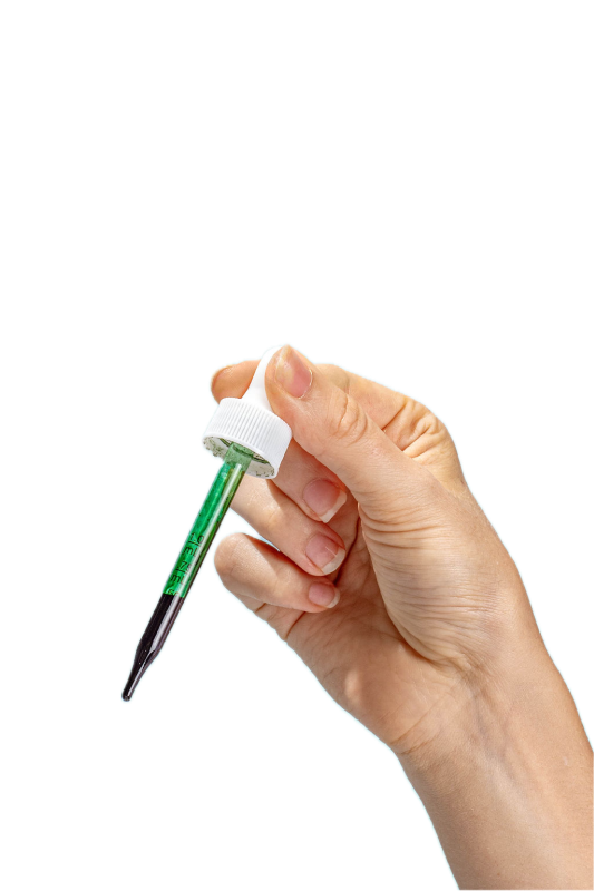 A woman holding a pipette filled with Happy V Liquid Chlorophyll, transparent background